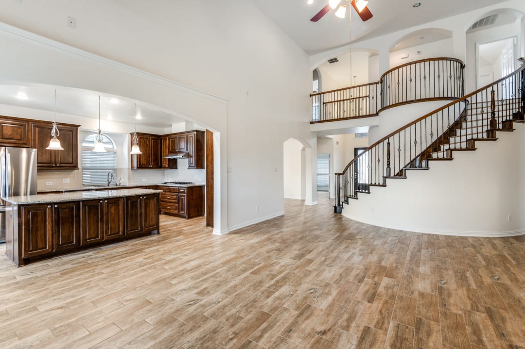 Renovated kitchen with large center island and refreshed cabinetry