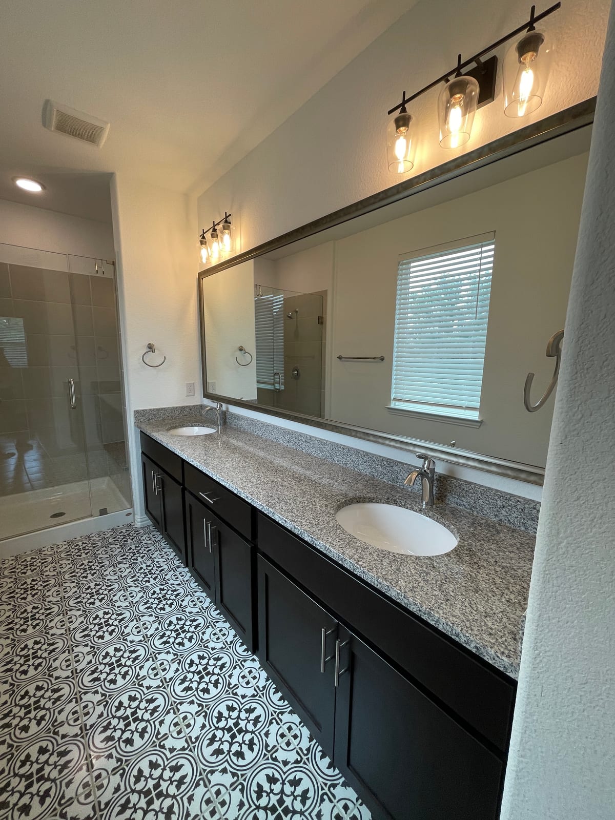 Sparkling dual-vanity bathroom after a deep cleaning