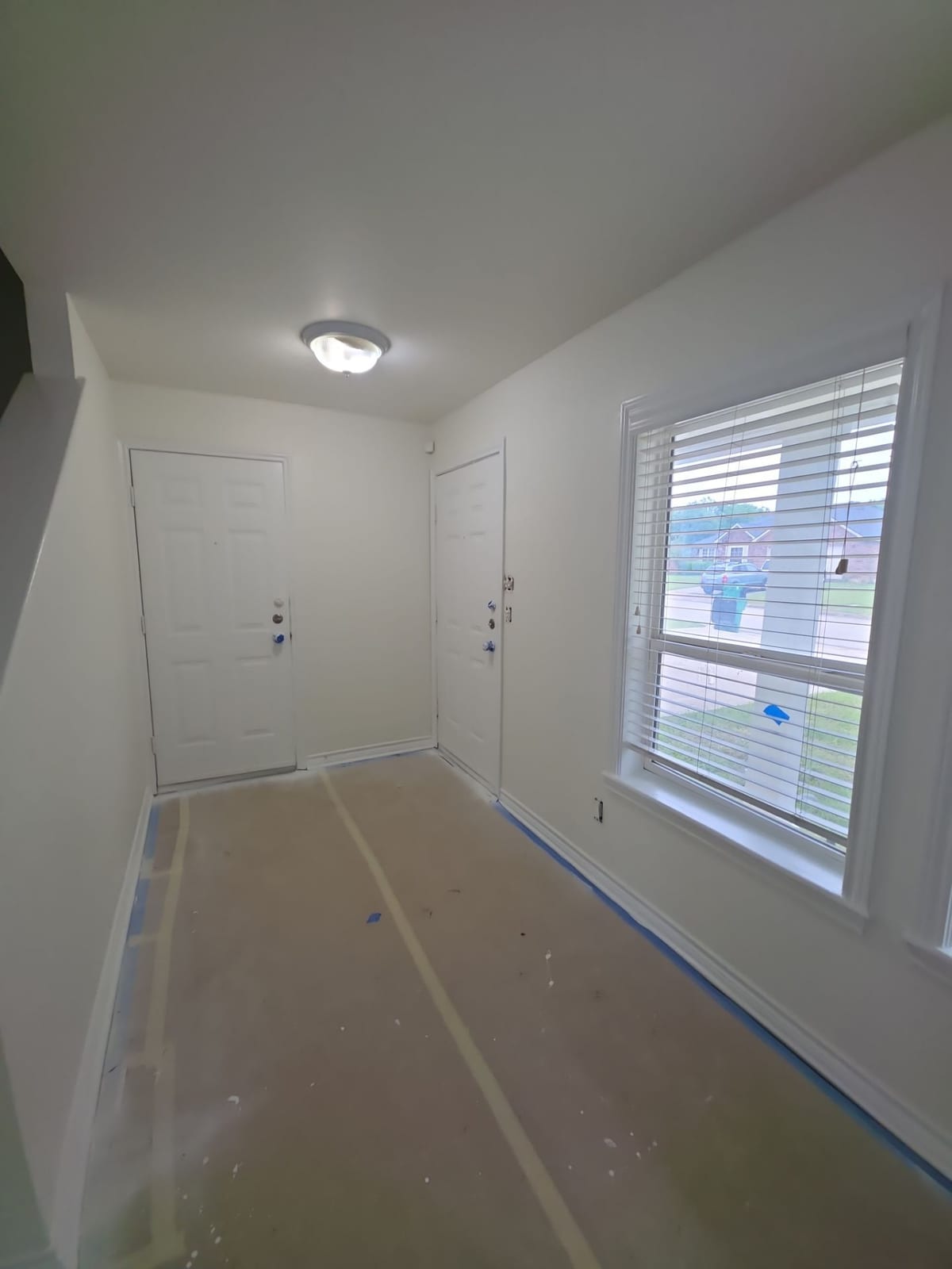 Freshly painted interior room with crisp white walls and trim