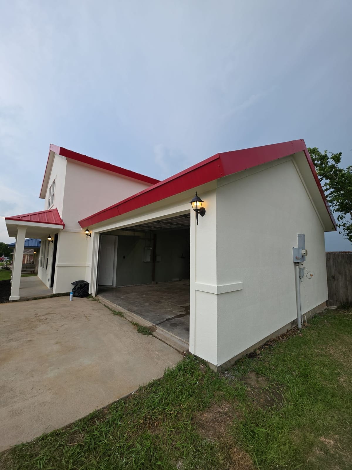 Whole-home exterior renovation with fresh paint and new roof